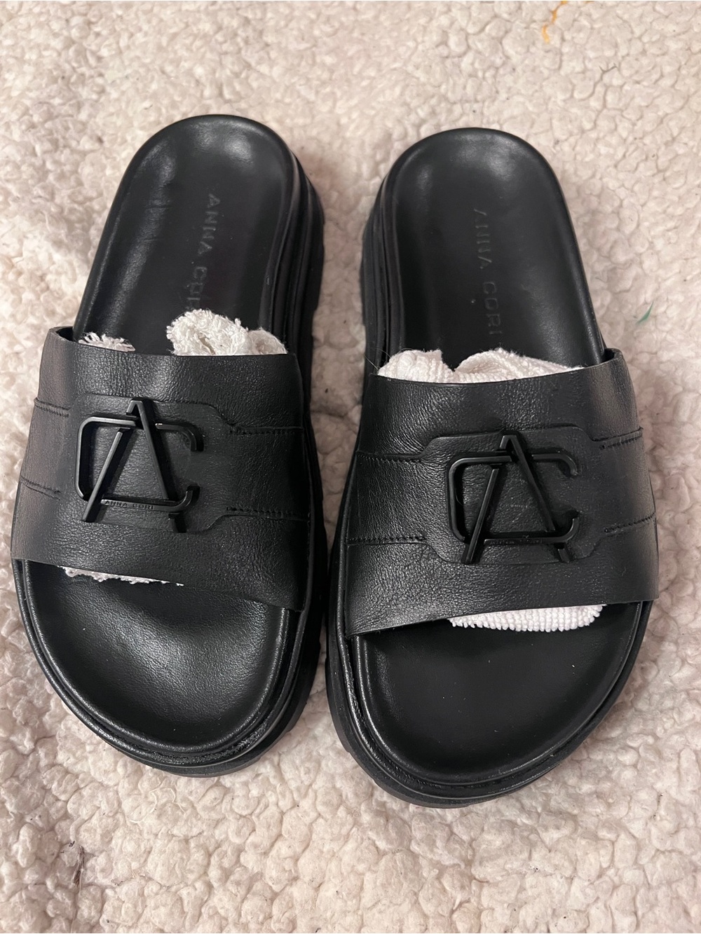 Anna Cori Black leather Slide Sandals with Logo Accent
